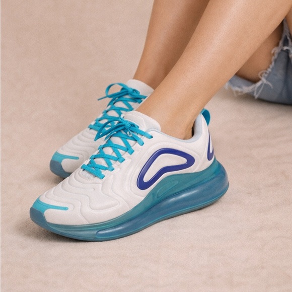 Nike Shoes - Nike White Sneakers with Teal and Blue Accents